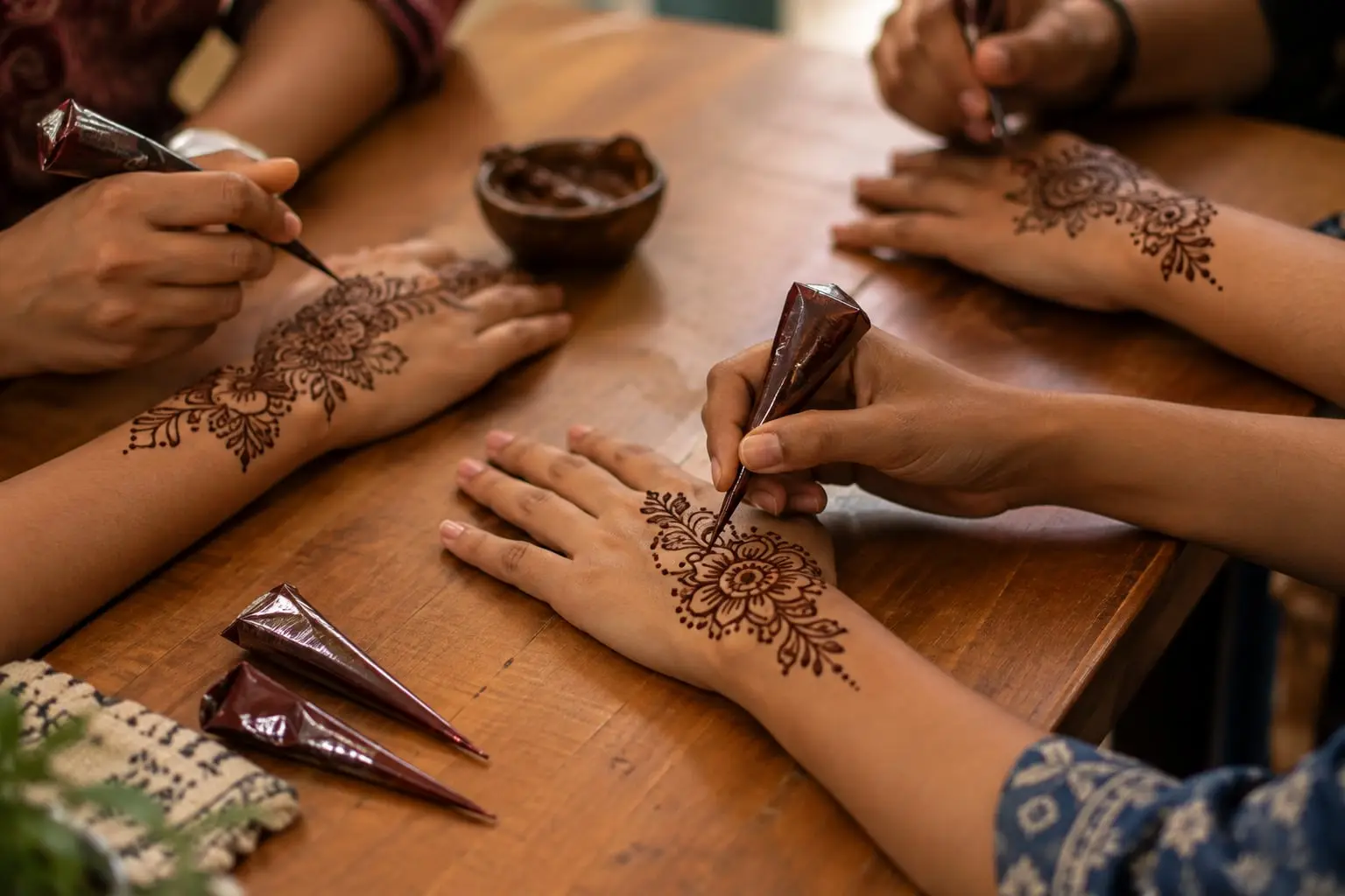 Students practising mehndi together